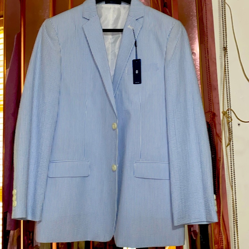 Nice suit color baby blue and white stripes with pink long sleeves shirt.Size 18